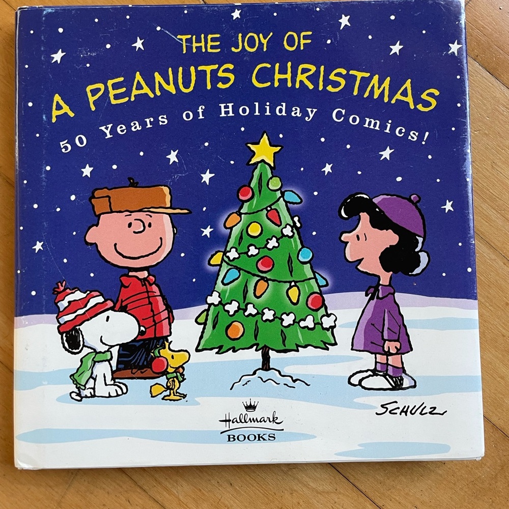 The Joy of a Peanuts Christmas: 50 Years of Holiday Comics by Charles Schultz